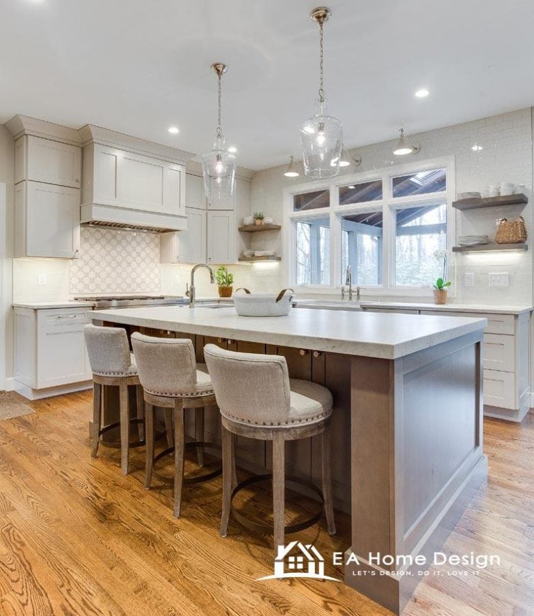 Dining area with checkered tablecloth, metal chairs, and kitchen view.