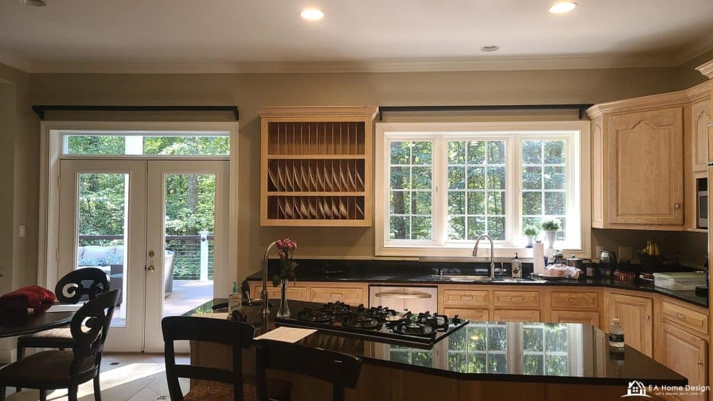 Luxurious kitchen with custom oak cabinets and stainless steel appliances for home remodeling.