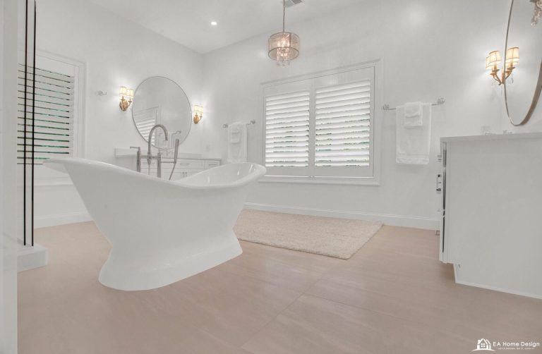 Modern bathroom with walk-in shower, freestanding bathtub, neutral tiles, and sleek fixtures