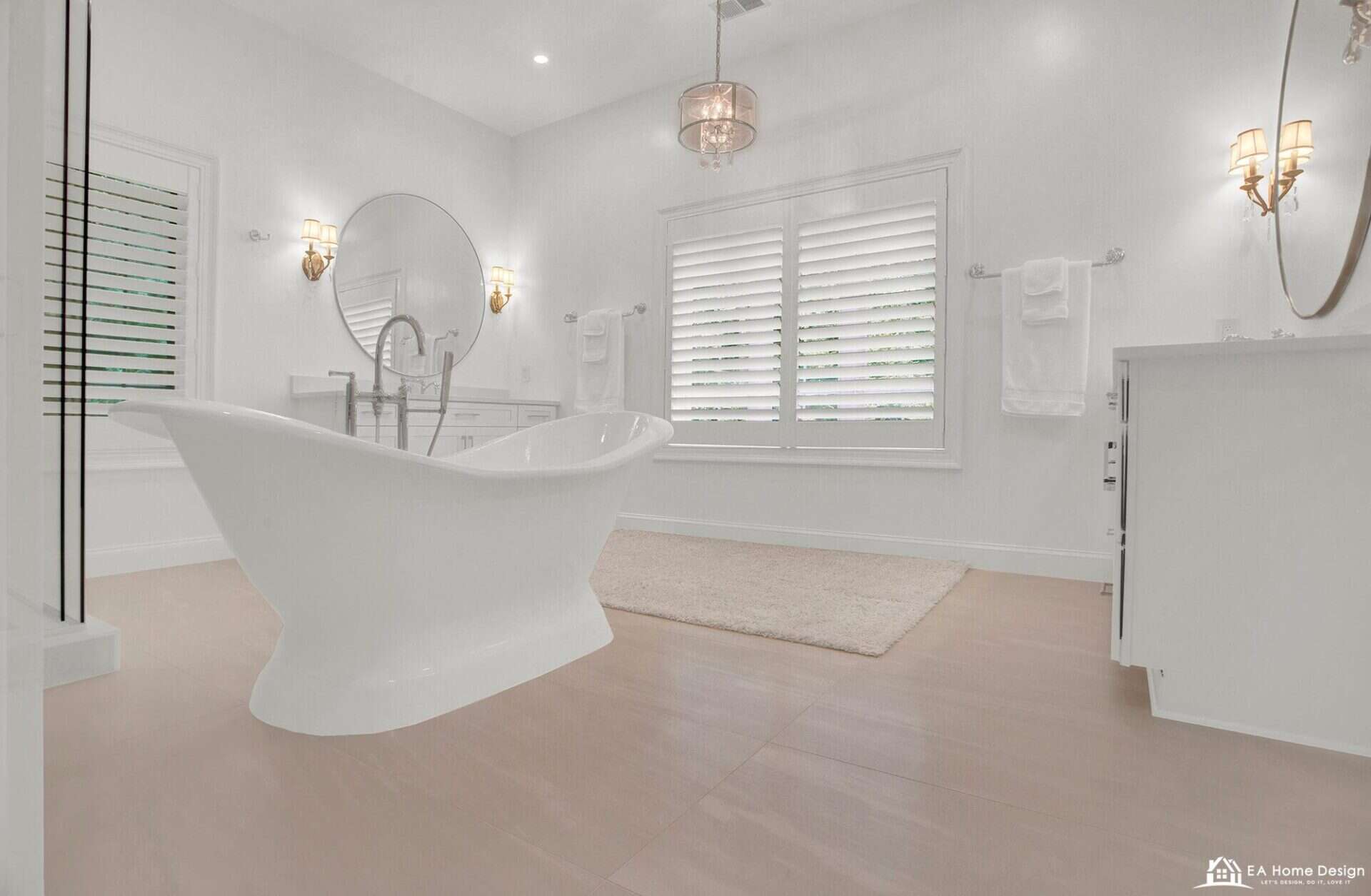 Modern bathroom with walk-in shower, freestanding bathtub, neutral tiles, and sleek fixtures