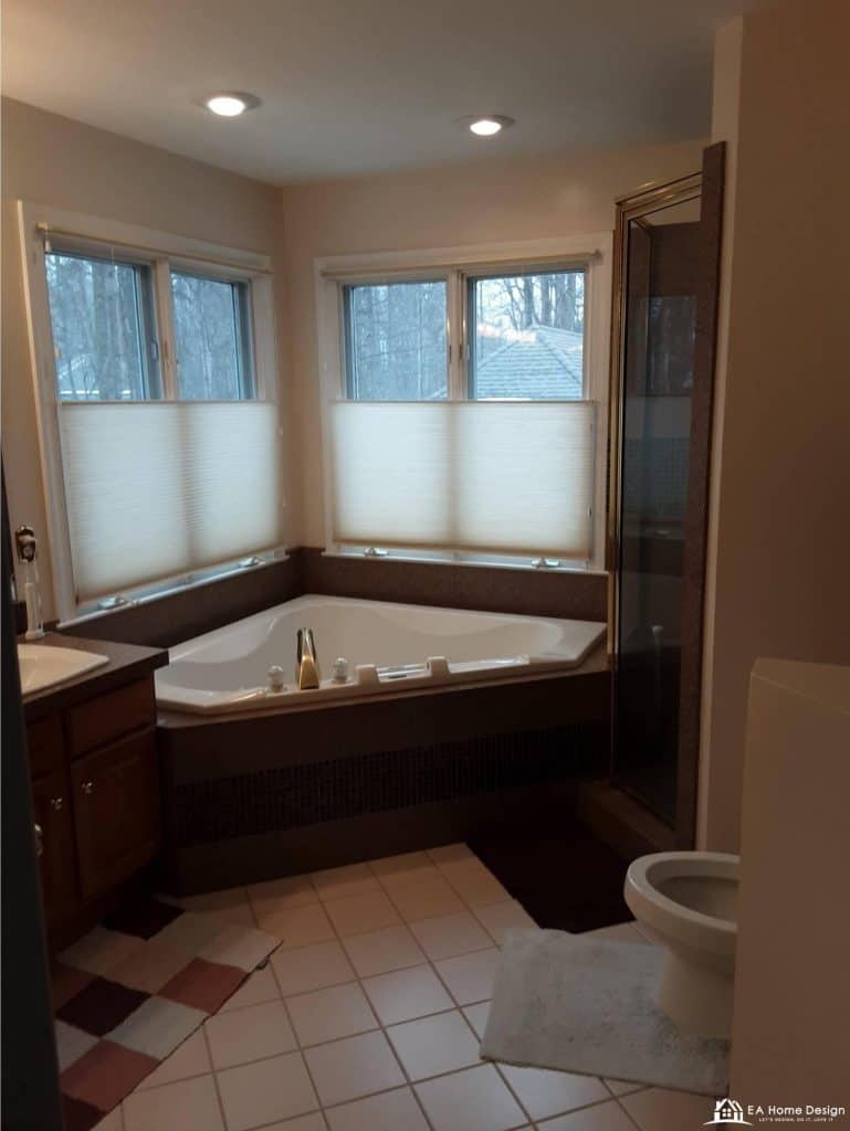 Modern bathroom renovation with custom cabinetry, premium vanity with integrated sink, backlit mirrors, and luxurious finishes blending elegance with practicality.