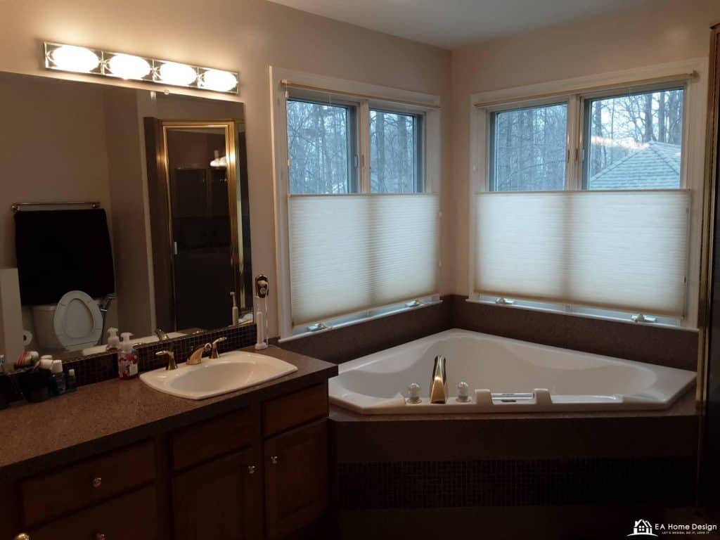Modern bathroom renovation with custom cabinetry, premium vanity with integrated sink, backlit mirrors, and luxurious finishes blending elegance with practicality.