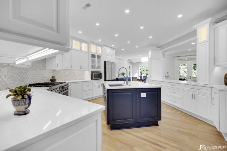 Luxury modular kitchen renovation with sleek modern cabinetry, premium benchtops, integrated sink, high-end appliances, and layered ambient and task lighting for a stylish, functional space.