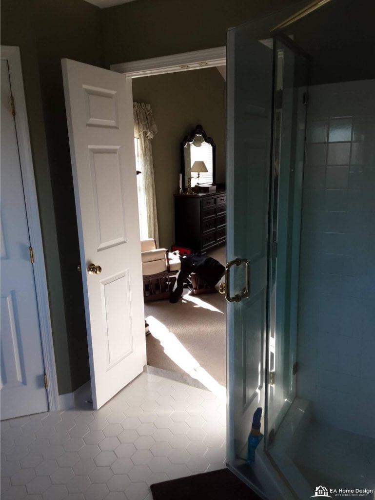 Modern luxury bedroom with sleek premium fittings, ambient recessed lighting, a large upholstered bed, mirrored wardrobe panels, and elegant bedside tables.