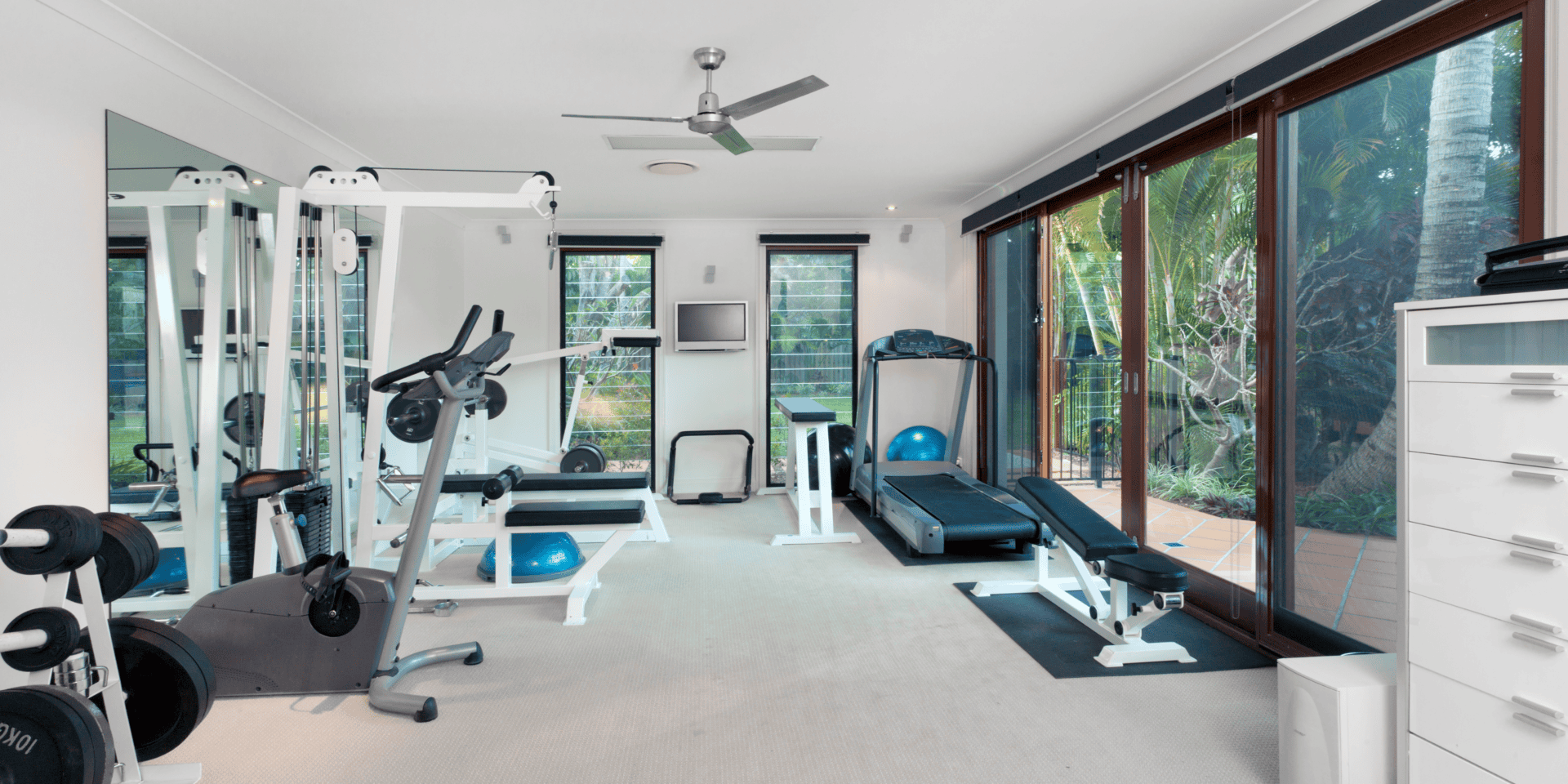 Home gym with rubber flooring and quality equipment