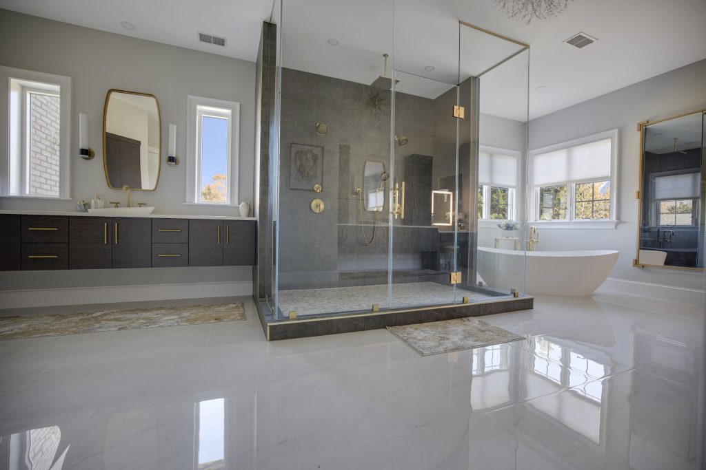 After: the walk-in shower in the centre of the room, vanities to the left and the freestanding tub to the right