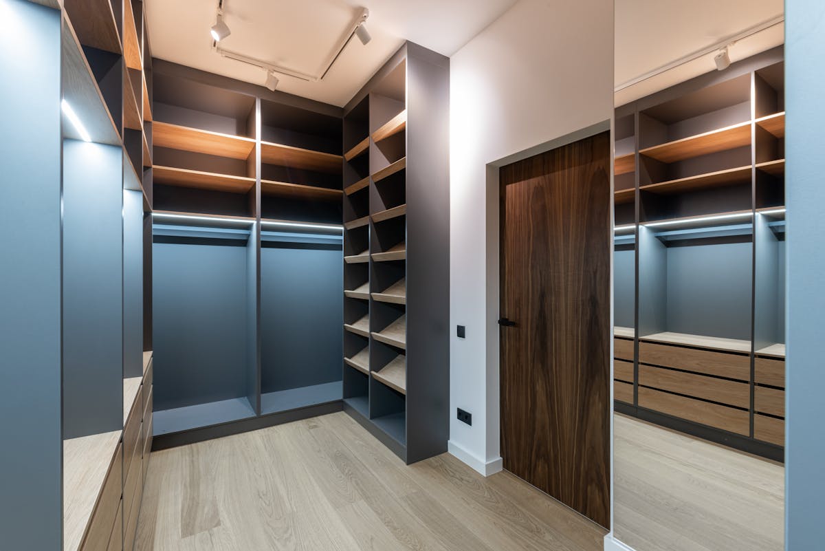 entryway closet converted into an organized mudroom station