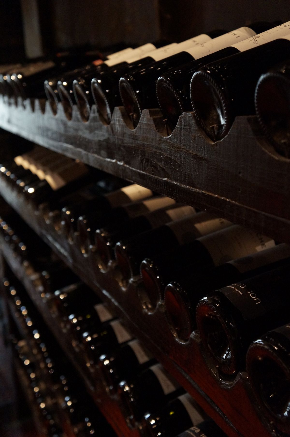 closet converted into a home wine cellar with wine racks