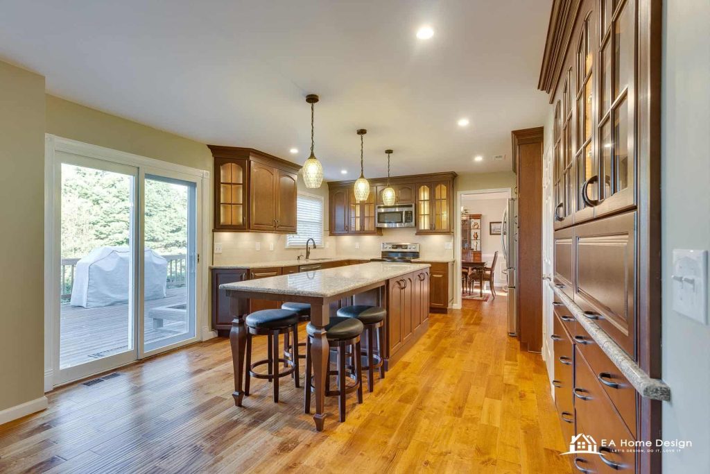 custom kitchen island with granite top and bar seating