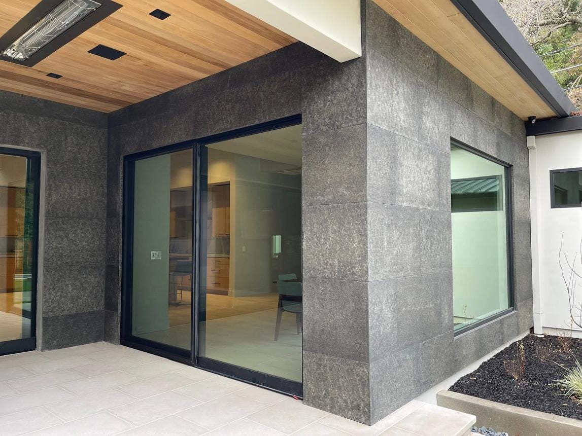 Black basalt exterior stone on a minimalist modern home